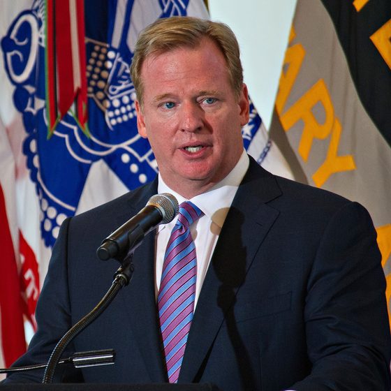 Roger Goodell speaking at a podium